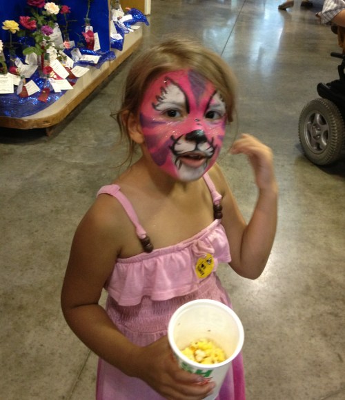 This sweet little honeybee was seen buzzing around the honey booth